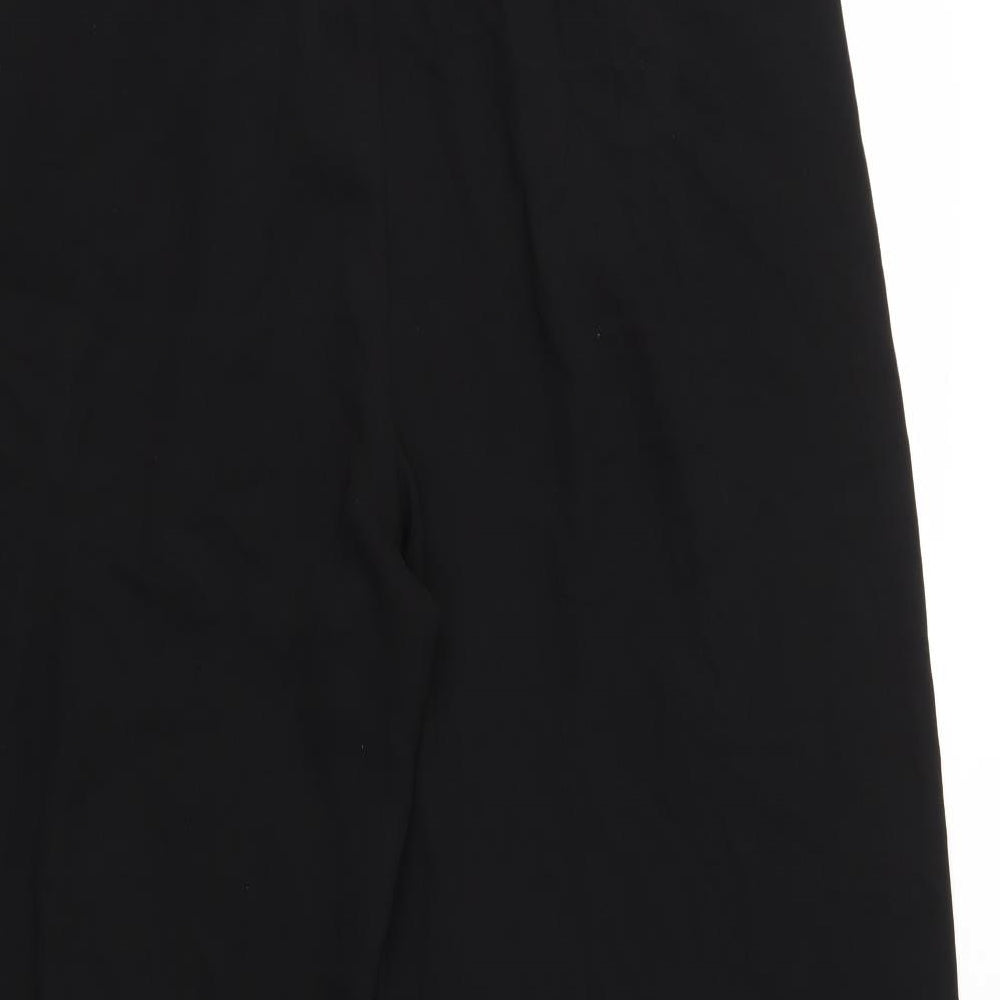 Brand and care label for Desires women’s black trousers, size UK 14, 28-inch leg