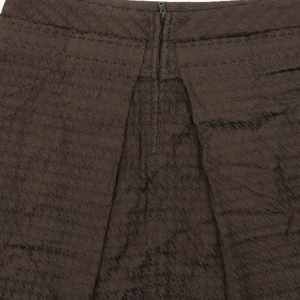 Brand and care label for Pringle women’s brown a-line skirt, size UK 10