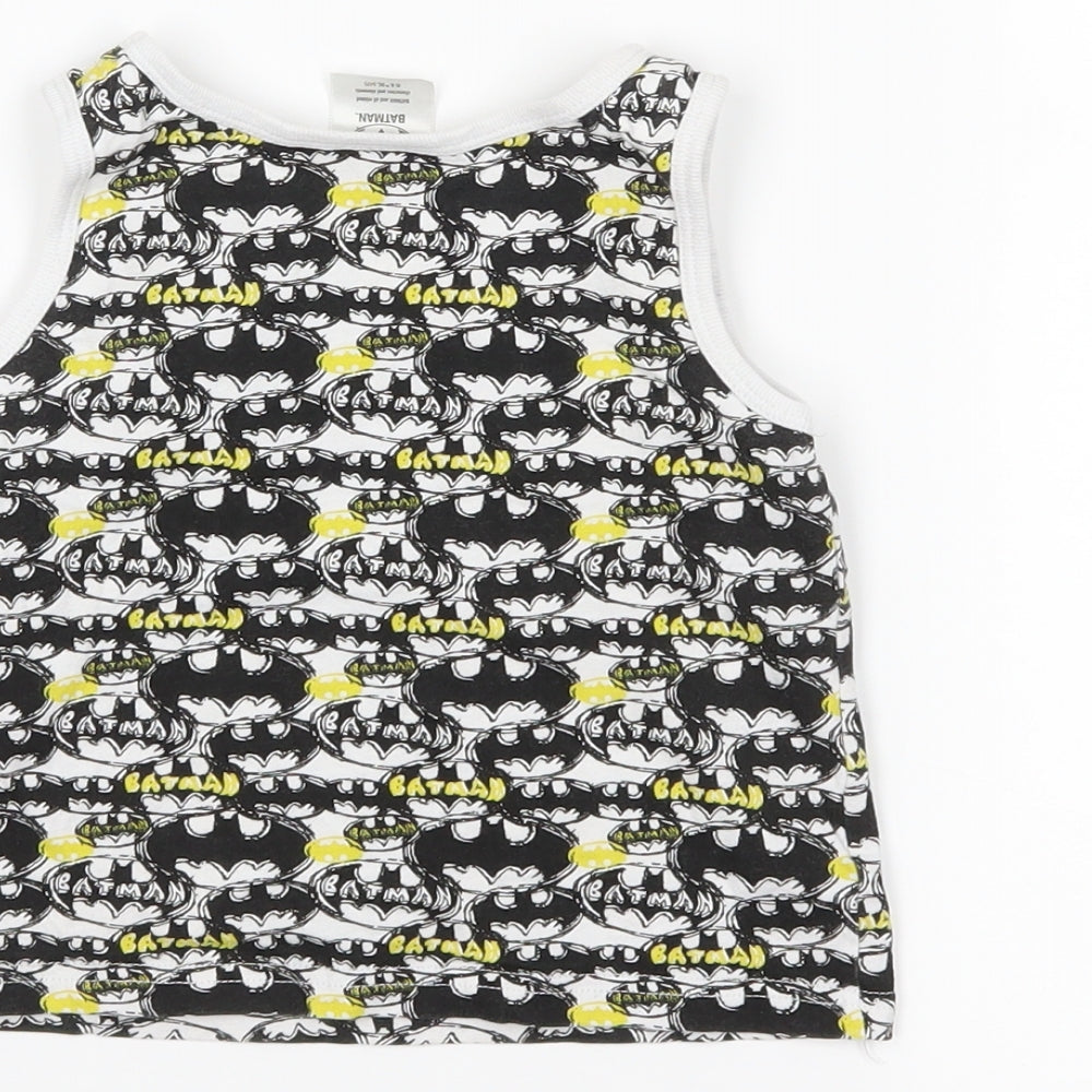 Brand and care label for Batman boys’ white basic tank, size 3-4, years