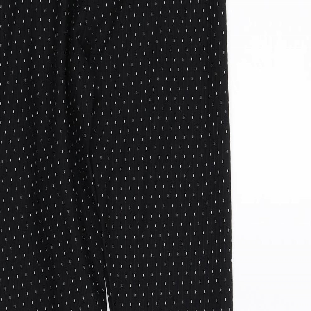 Brand and care label for Zara women’s black jegging leggings, size S, 20-inch leg