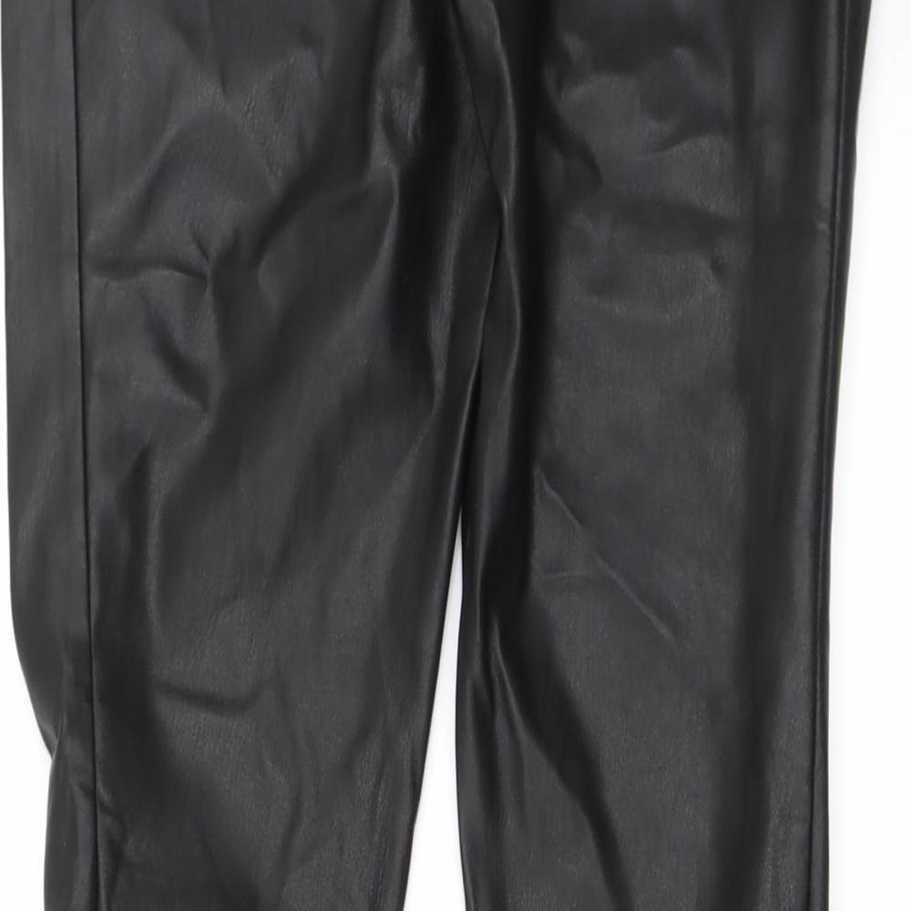 Brand and care label for Next women’s black trousers, size UK 8, 27-inch leg