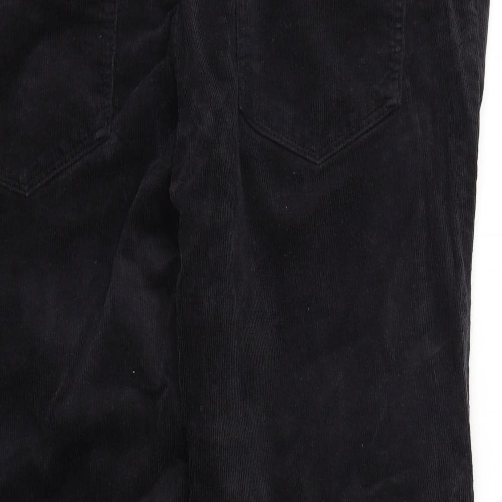 Brand and care label for Tu women’s black trousers, size M, 32-inch leg
