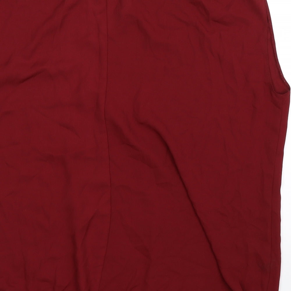Brand and care label for Arcadia women’s brown basic blouse, size UK 18