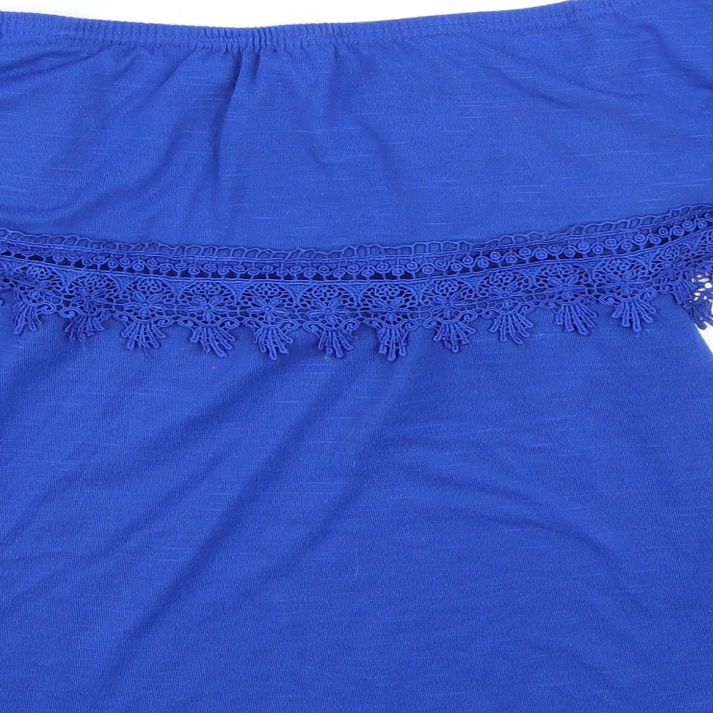 Brand and care label for Peacocks women’s blue basic blouse, size UK 8