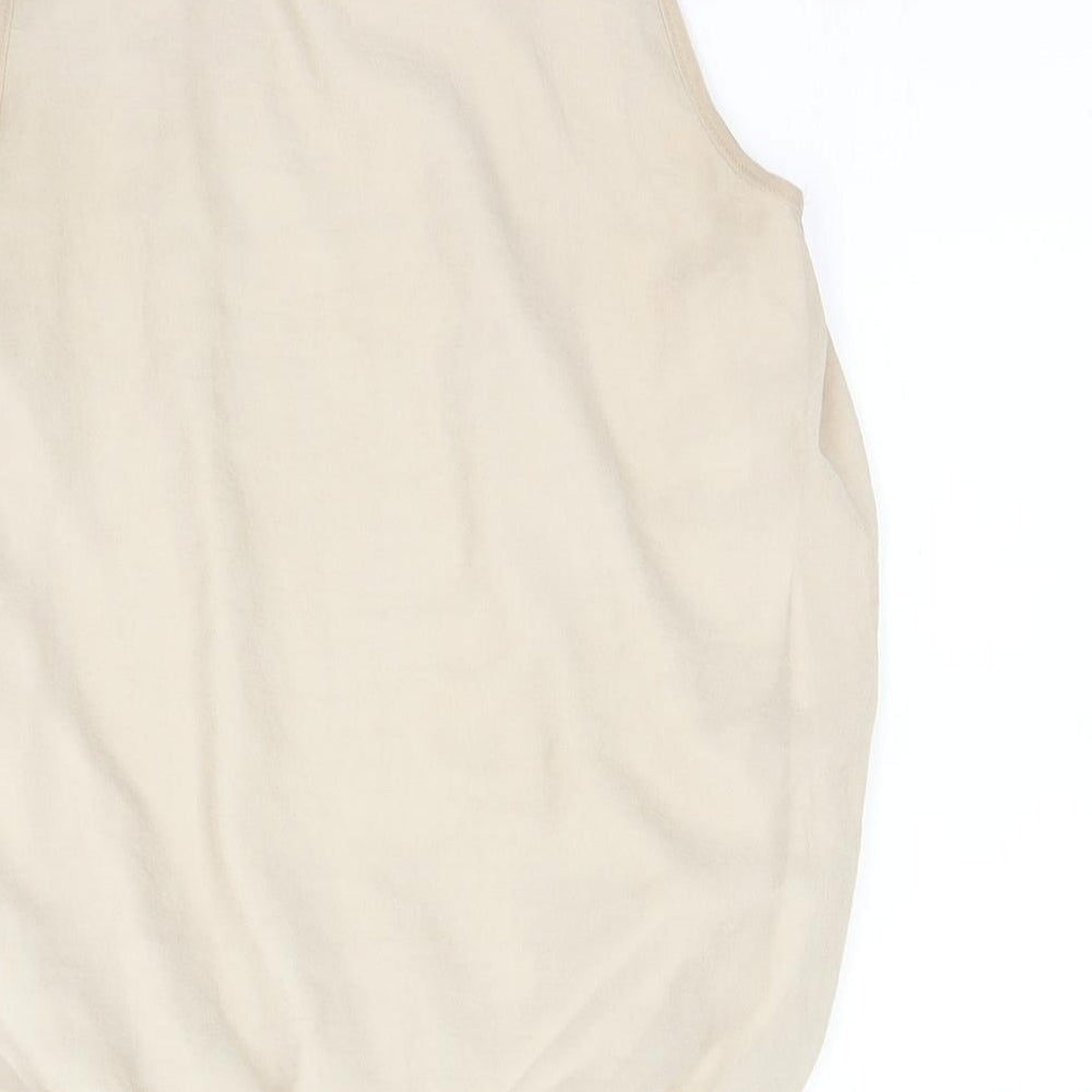Brand and care label for Autonomy women’s beige basic blouse, size UK 10