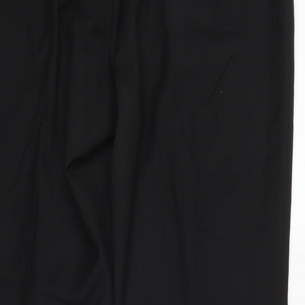 Brand and care label for Wilson women’s black trousers, size UK 34, in, 29-inch leg