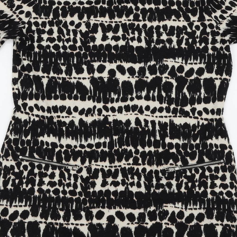 Brand and care label for F&F women’s black animal print basic blouse, size UK 8