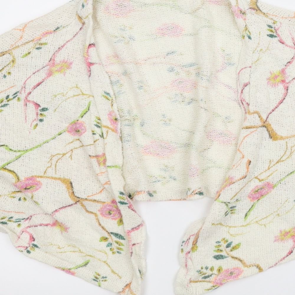 Brand and care label for Zara girls’ ivory floral cardigan jumper, size 9, years - bolero