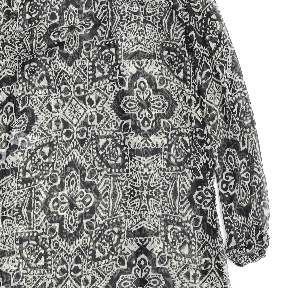 Brand and care label for Papaya women’s black fit & flare, size UK 14