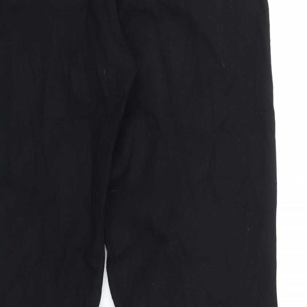 Brand and care label for Debenhams women’s black trousers, size UK 12, 30-inch leg