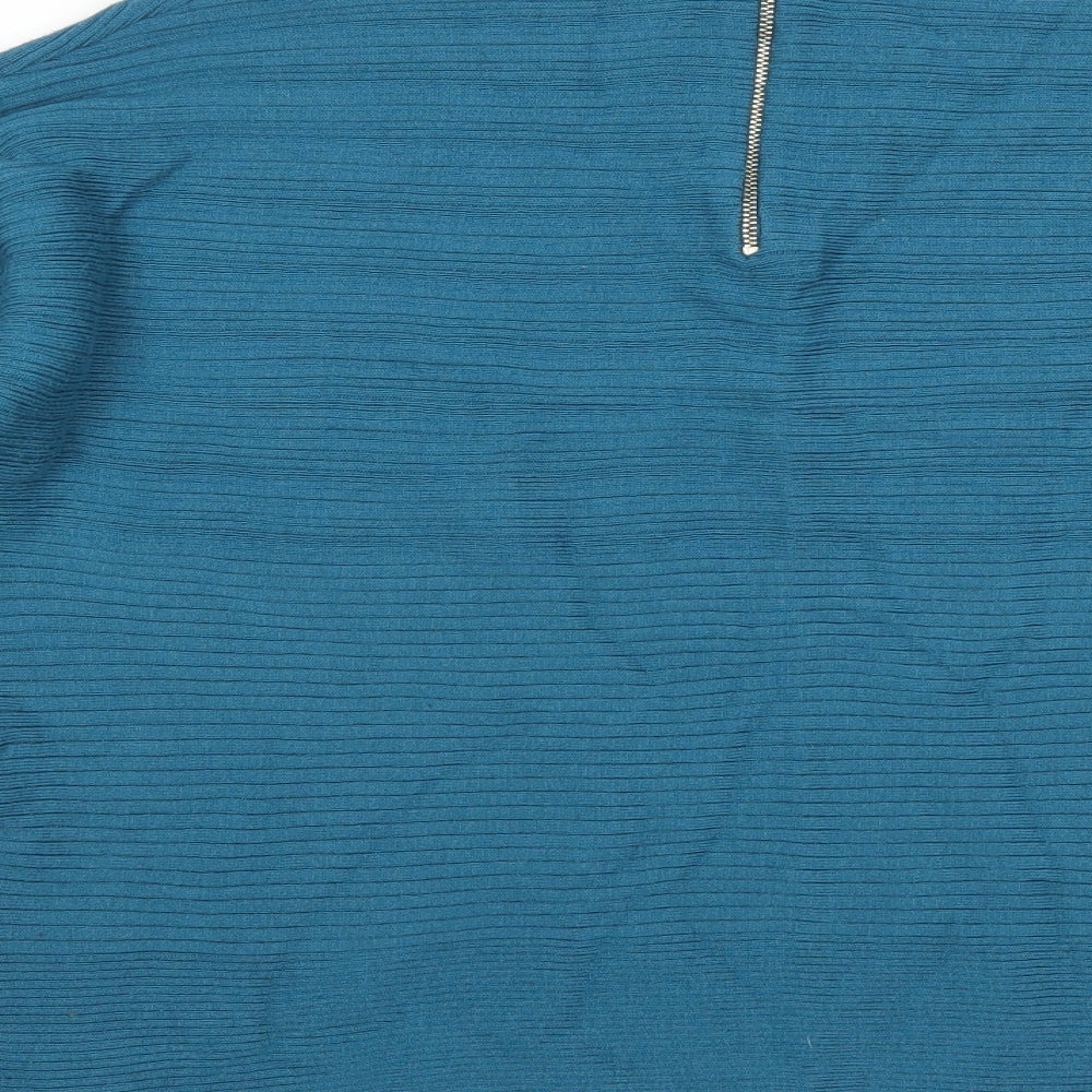 Brand and care label for Tu women’s blue jumper, size UK 16