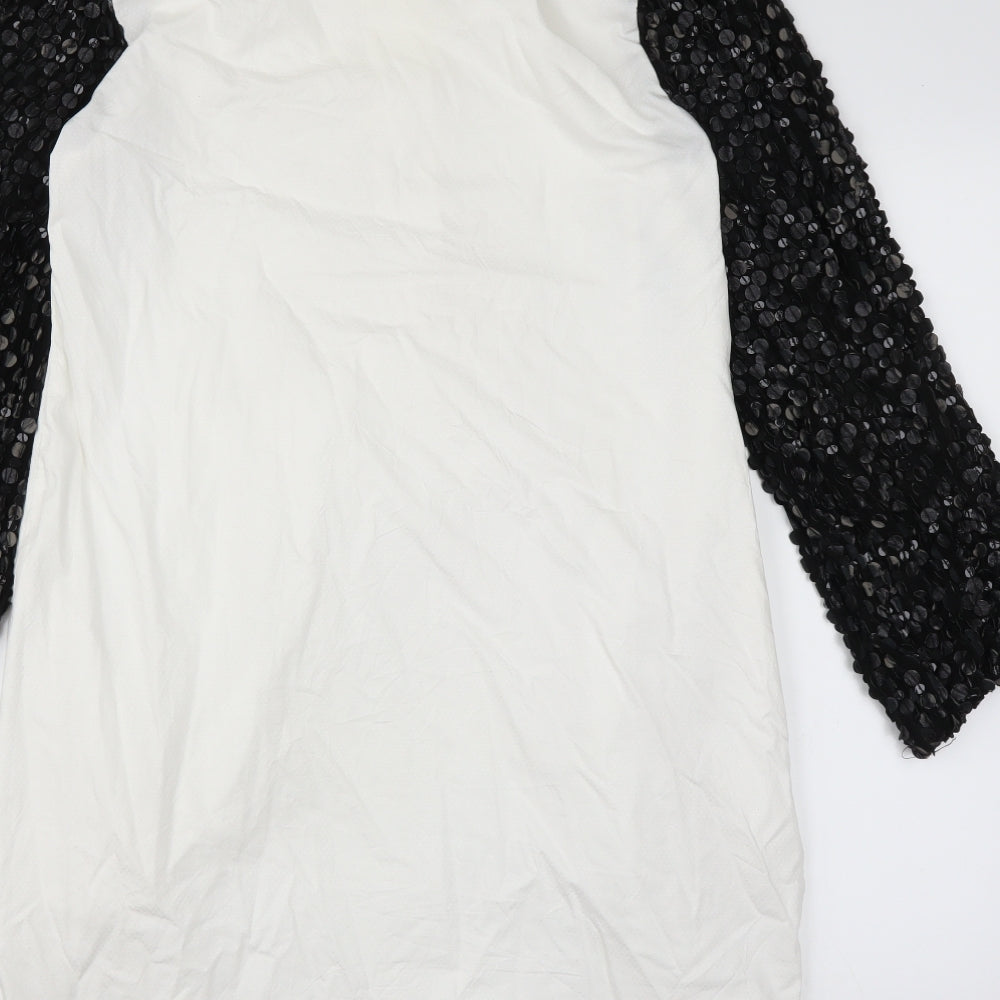 Brand and care label for embroideries gallery women’s white basic blouse, size L
