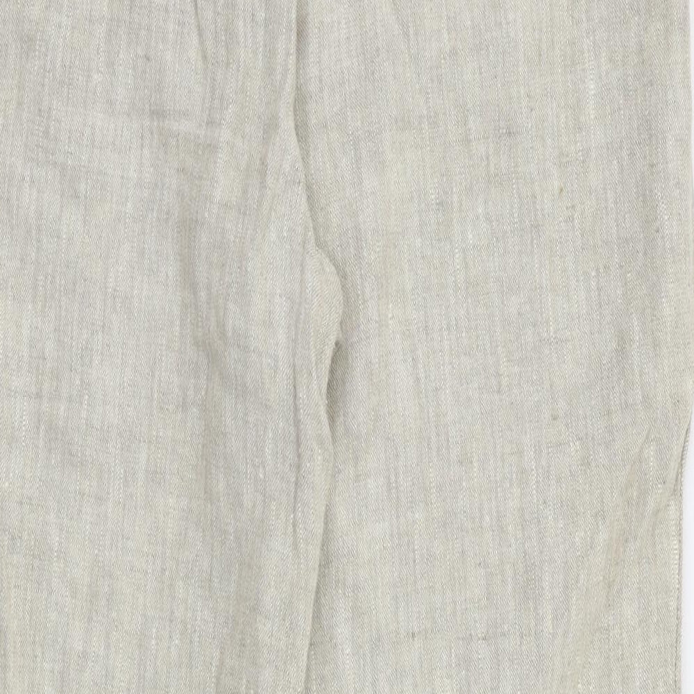 Brand and care label for Country Casuals women’s beige trousers, size UK 14, 28-inch leg