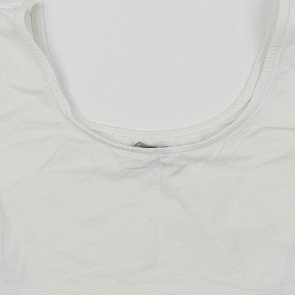 Brand and care label for ASOS women’s white cropped t-shirt, size UK 4