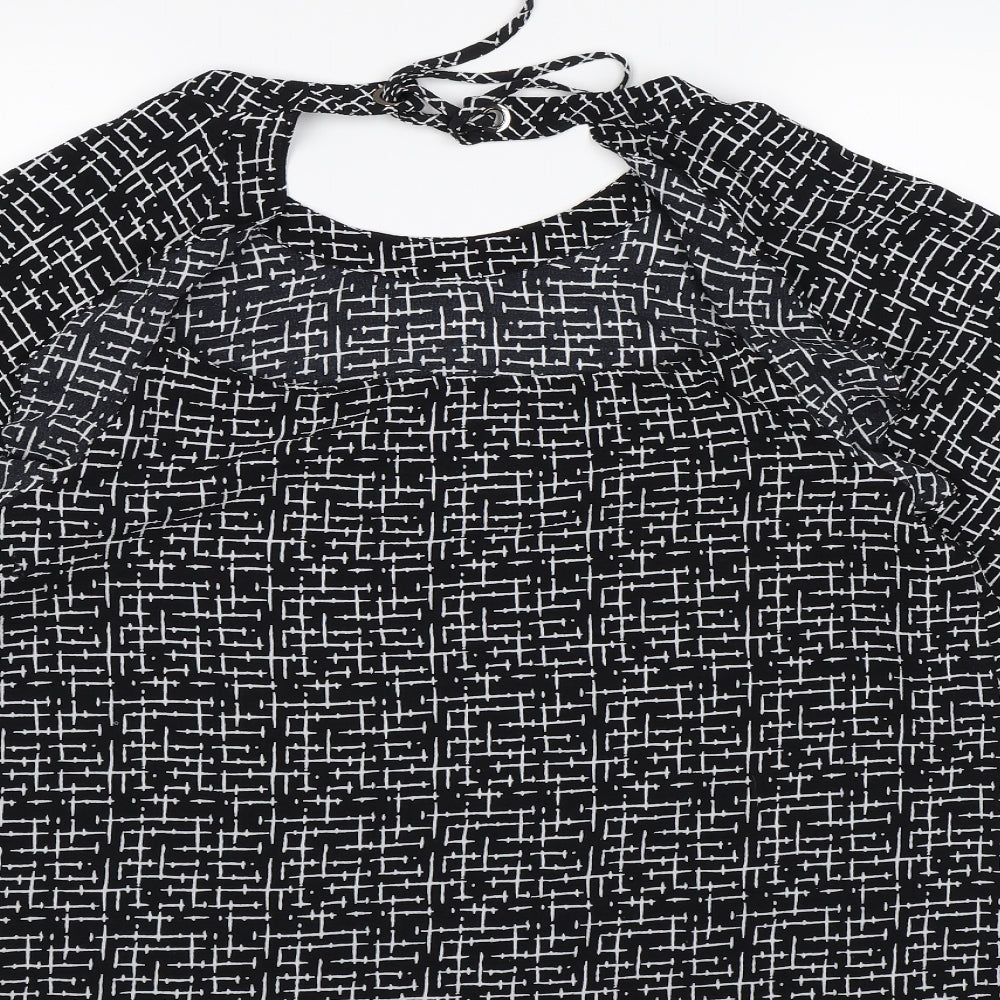 Brand and care label for Nutmeg women’s black check chiffon basic blouse, size UK 14