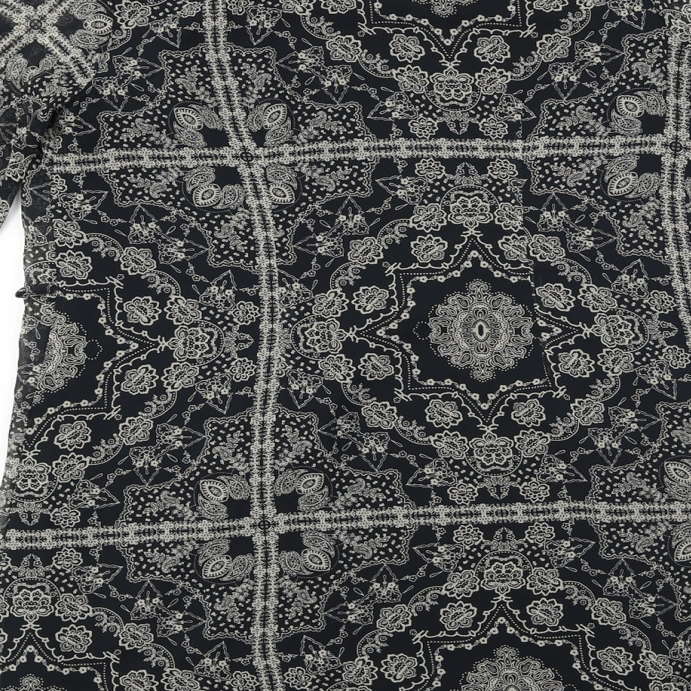 Brand and care label for Atmosphere women’s black fair isle a-line, size UK 10