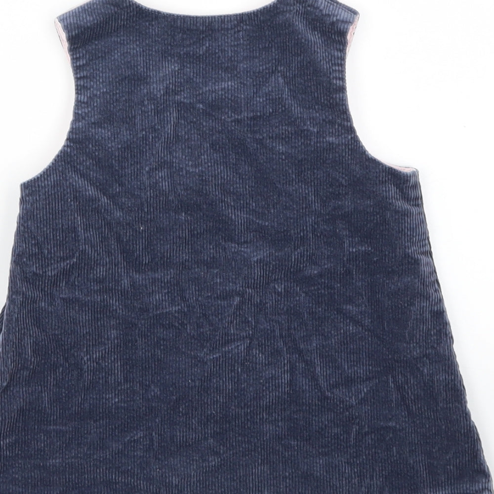 Brand and care label for BEL BIMBO girls’ blue animal print a-line, size 12-18, months