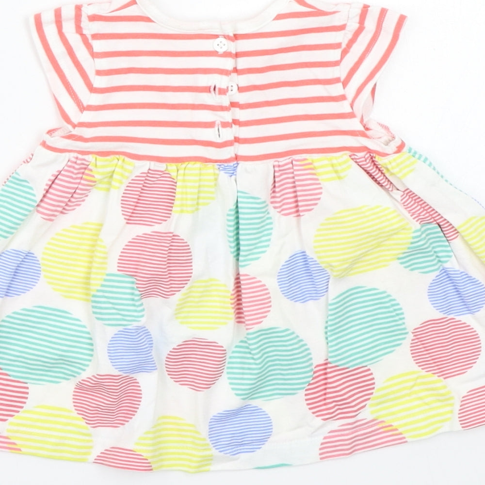 Brand and care label for Mothercare girls’ white striped basic t-shirt, size 3-6, months