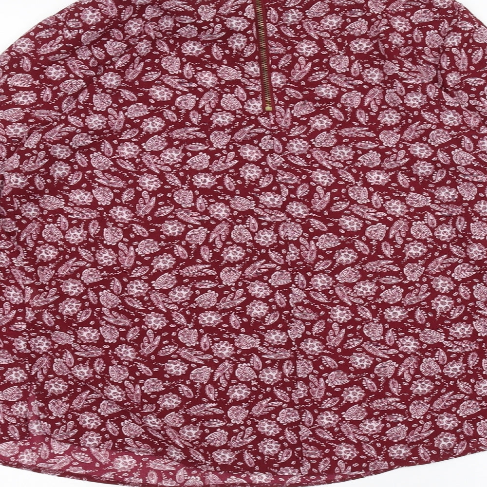 Brand and care label for Atmosphere women’s red basic blouse, size UK 10