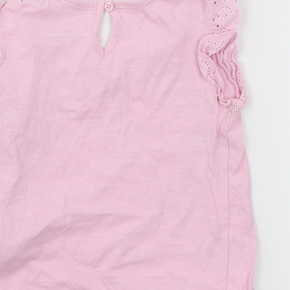 Brand and care label for Primark girls’ pink jersey basic t-shirt, size 18-24, months
