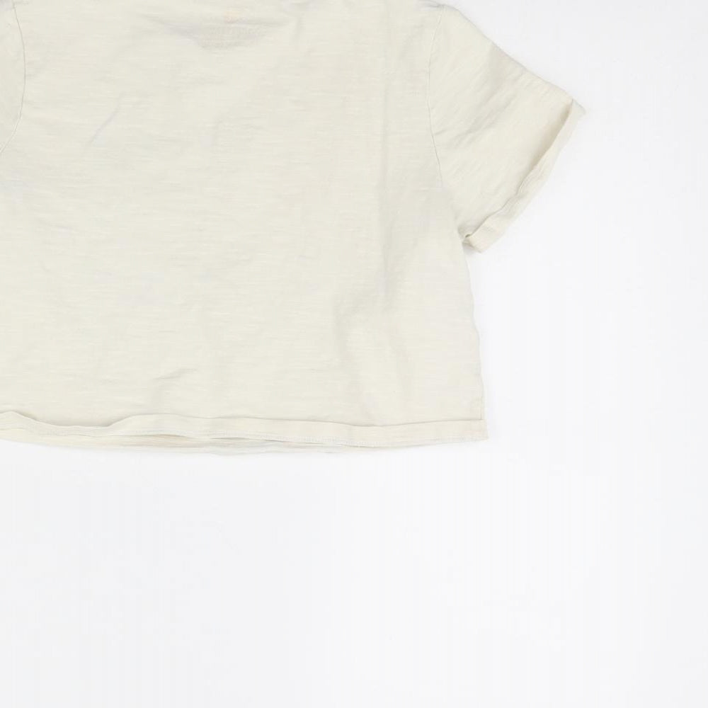 Brand and care label for F&F girls’ beige cropped t-shirt, size 10, years - nyc