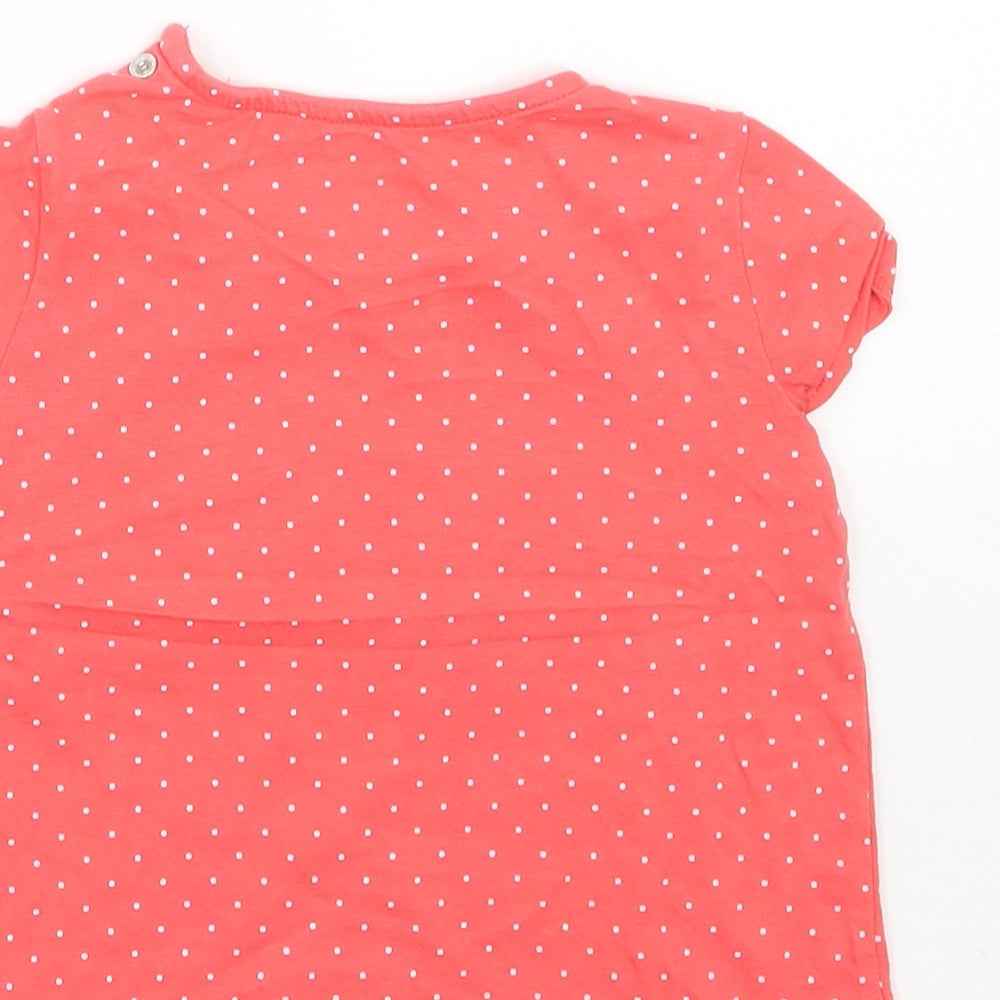 Brand and care label for F&F girls’ red polka dot basic t-shirt, size 9-12, months