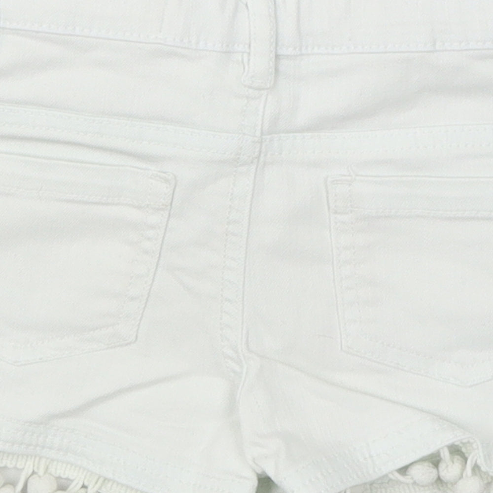 Brand and care label for Denim Co girls’ white denim cut-off shorts, size 5-6, years - pom pom