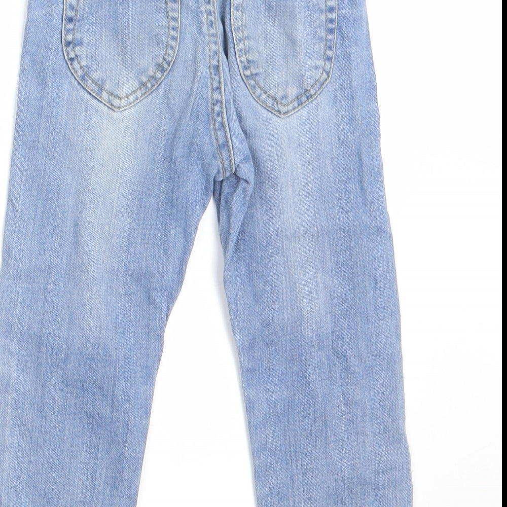 Brand and care label for NAME IT girls’ blue cargo jeans, size 18-24, months