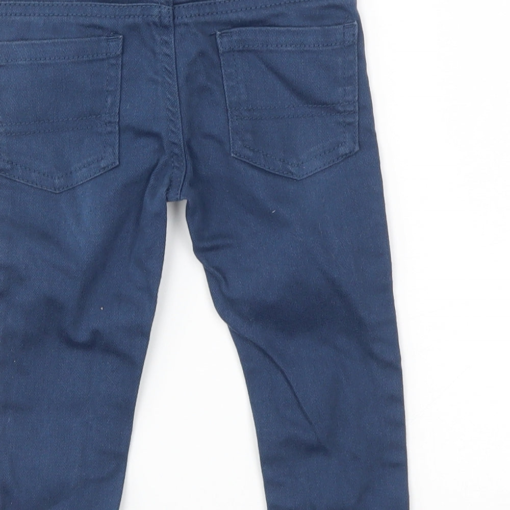Brand and care label for DENIM&CO girls’ blue capri jeans, size 9-12, months