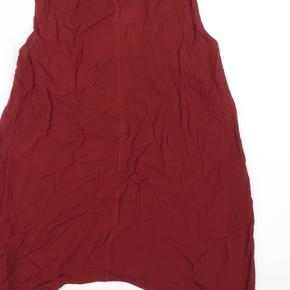 Brand and care label for Atmosphere women’s red basic tank, size UK 8