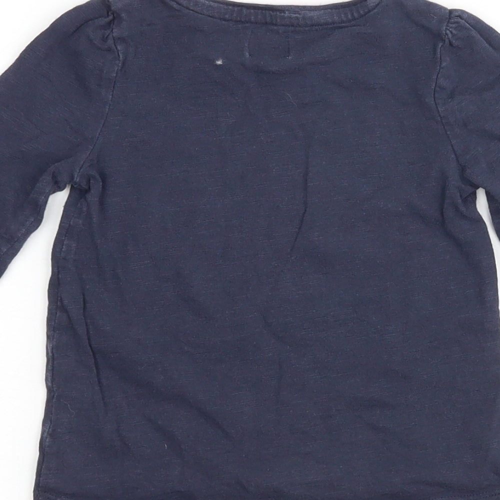 Brand and care label for F&F girls’ blue basic casual, size 12-18, months