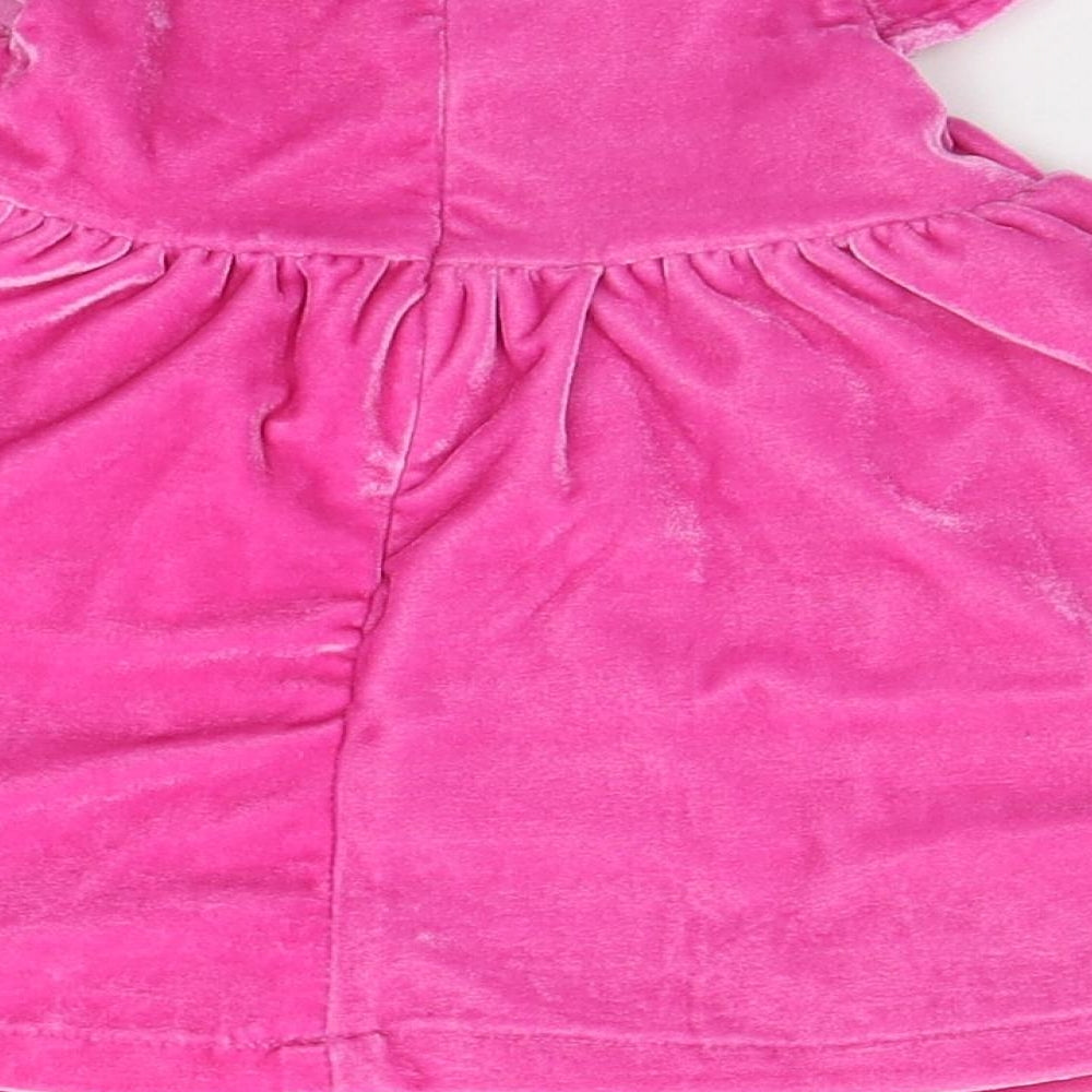 Brand and care label for Coolclub girls’ pink fit & flare, size 6-9, months