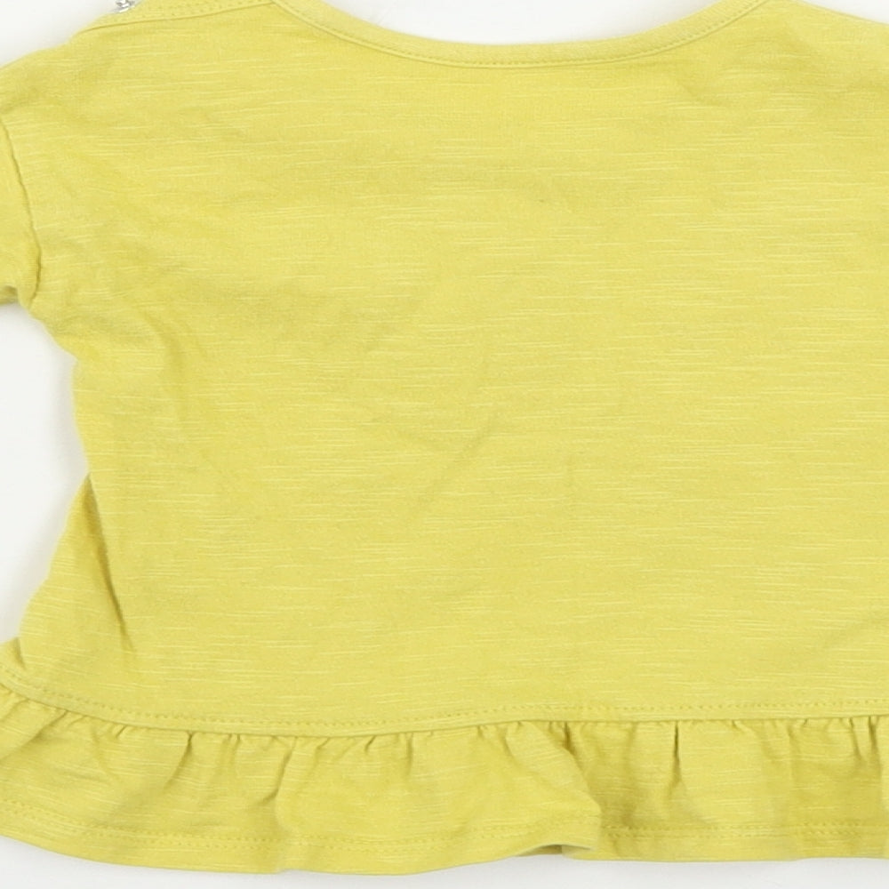 Brand and care label for George girls’ yellow basic t-shirt, size 3-6, months