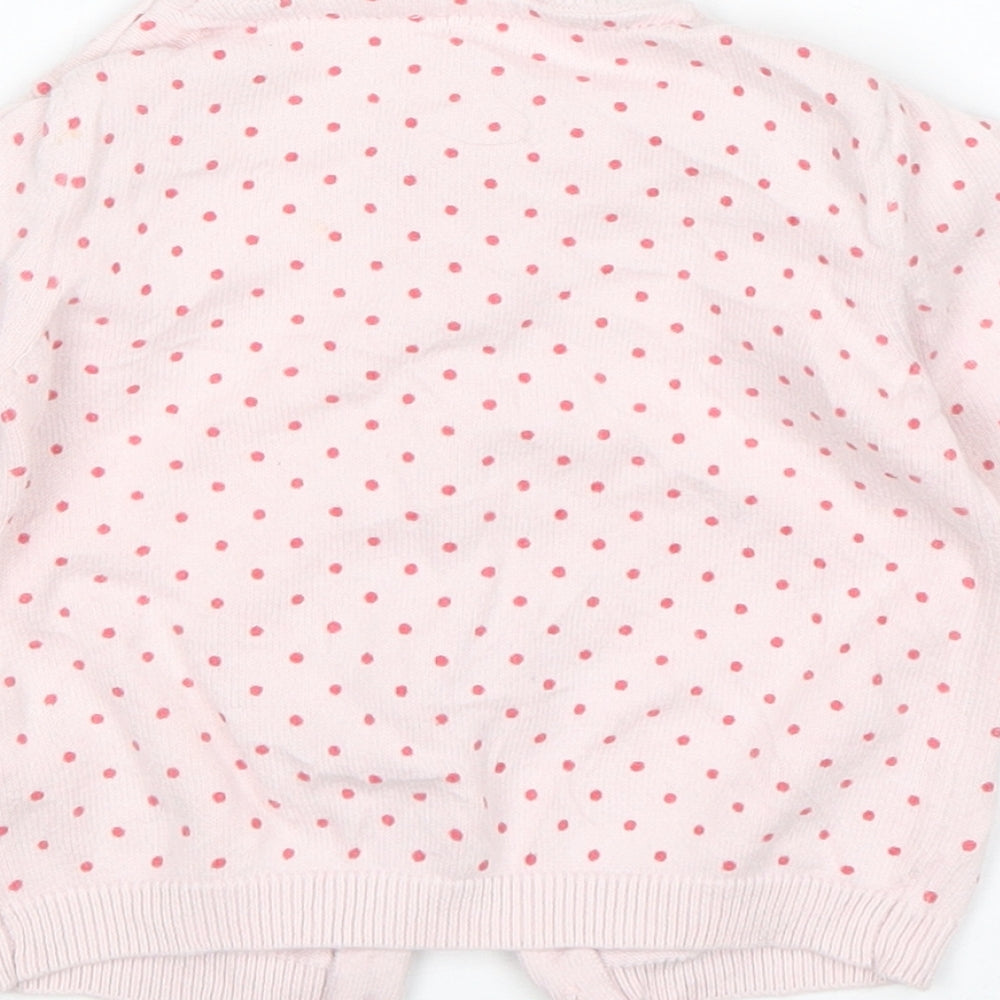 Brand and care label for F&F girls’ pink polka dot cardigan jumper, size 3-6, months