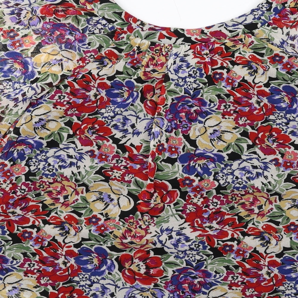 Brand and care label for Dunnes women’s multicoloured floral polyester basic blouse, size UK 8, round neck