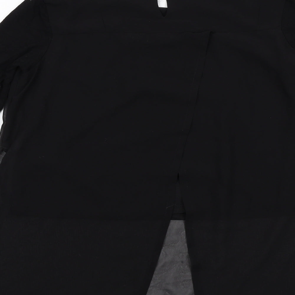 Brand and care label for H&M girls’ black polyester basic blouse, size 12-13, years round neck buckle