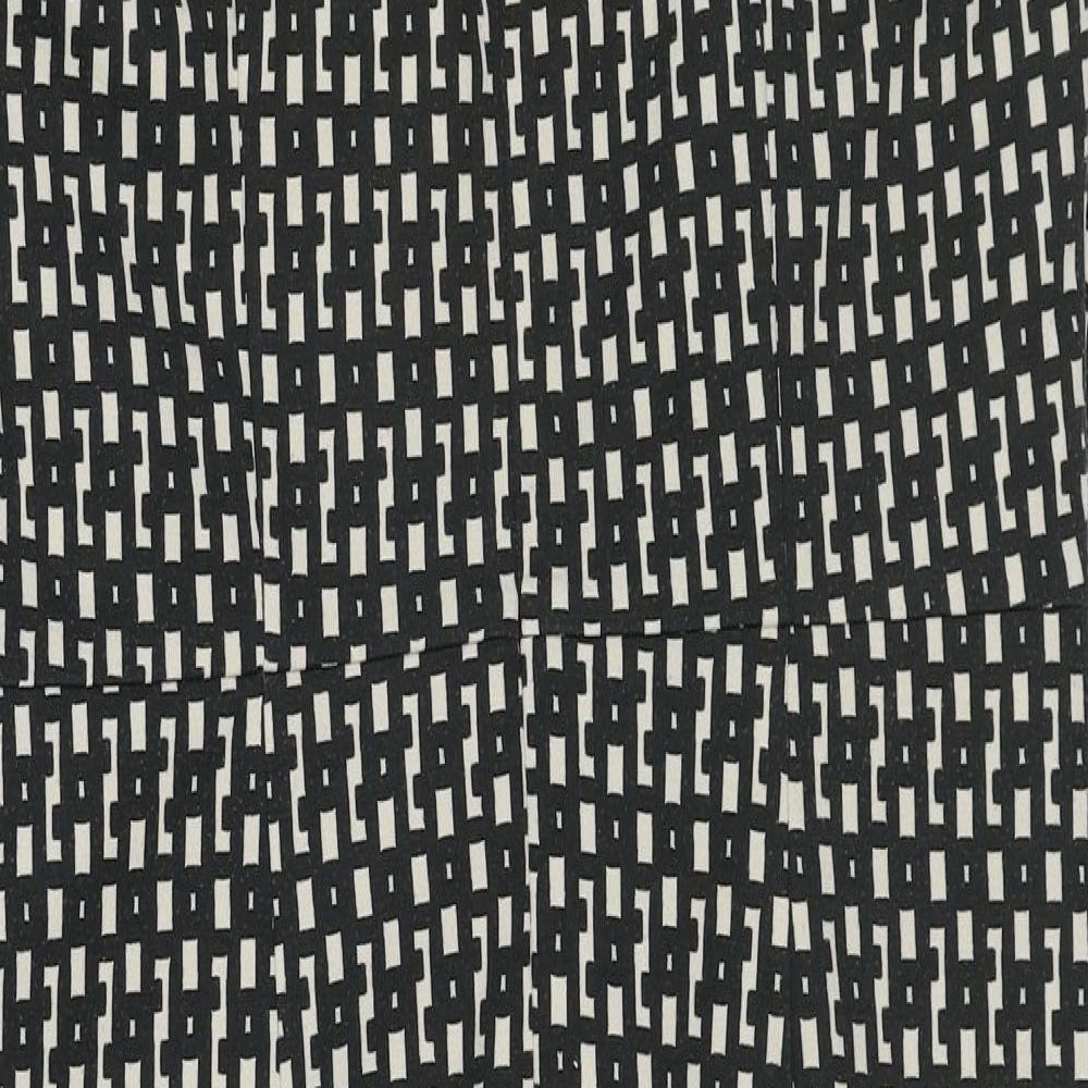 Brand and care label for Linea women’s black geometric polyester shift, size UK 14, round neck zip