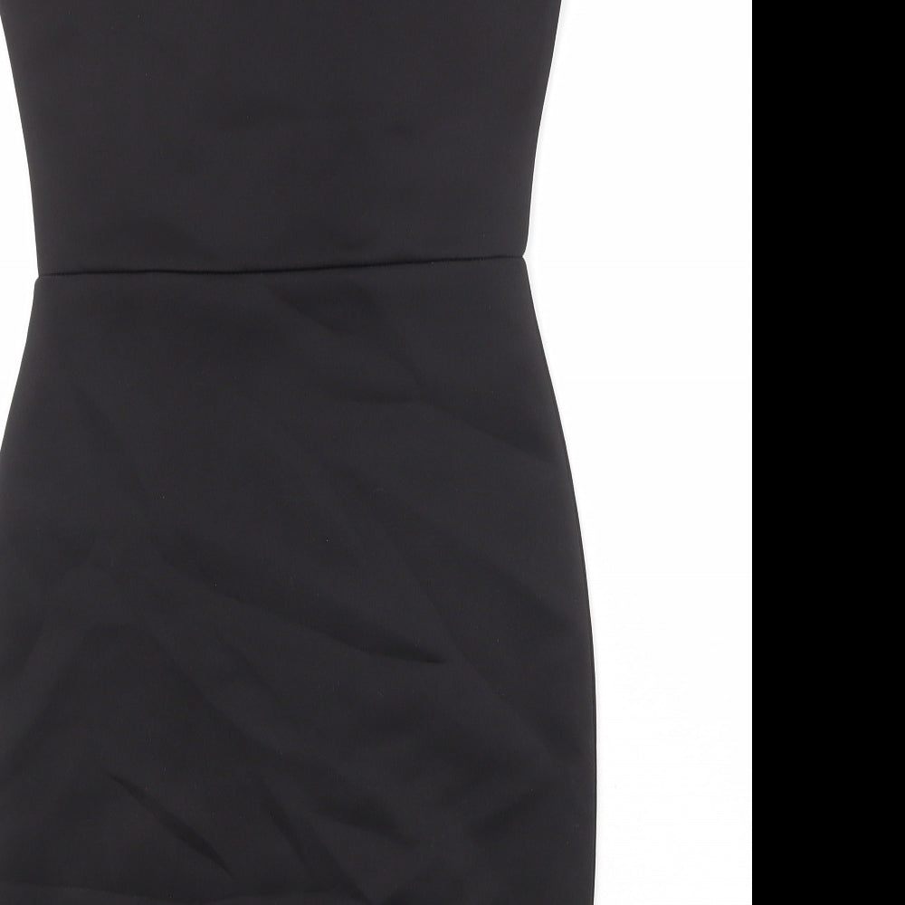 Brand and care label for Missguided women’s black polyester bodycon, size UK 8, round neck pullover