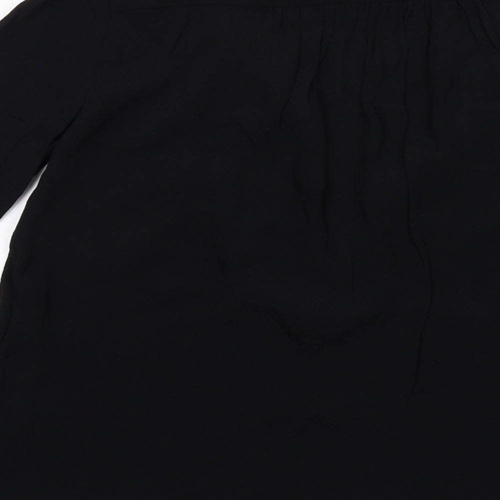 Brand and care label for ASOS women’s black viscose basic blouse, size UK 6, v-neck