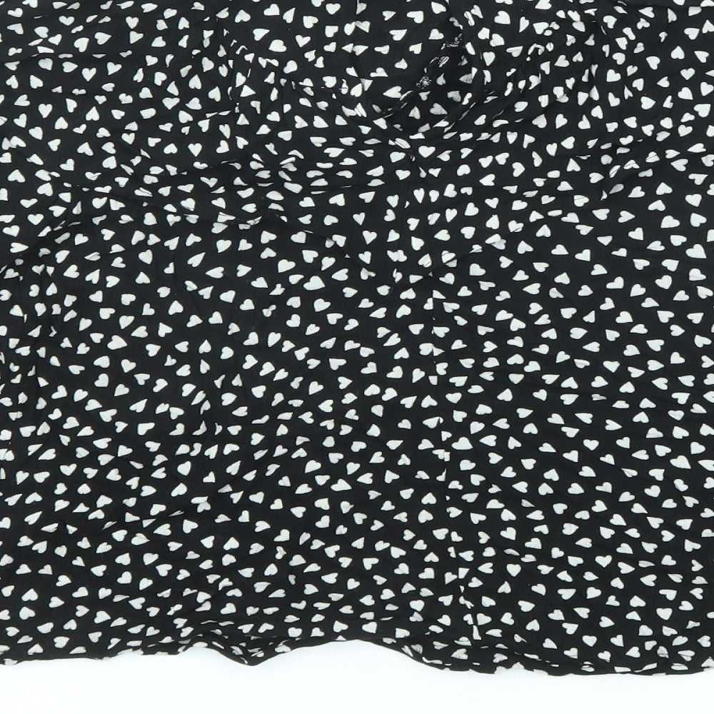 Brand and care label for Next girls’ black geometric viscose basic button-up, size 13, years v-neck button - heart pattern
