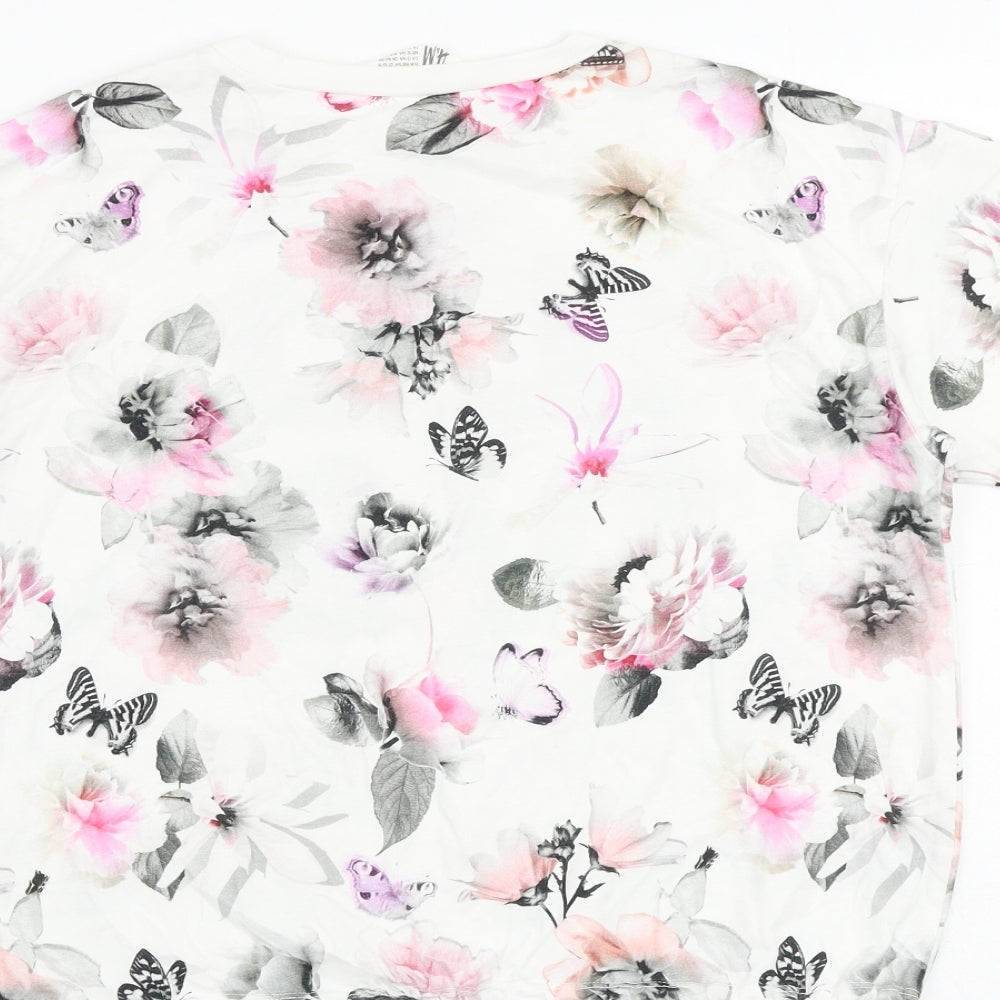 Brand and care label for H&M girls’ white floral cotton basic blouse, size 11-12, years crew neck pullover