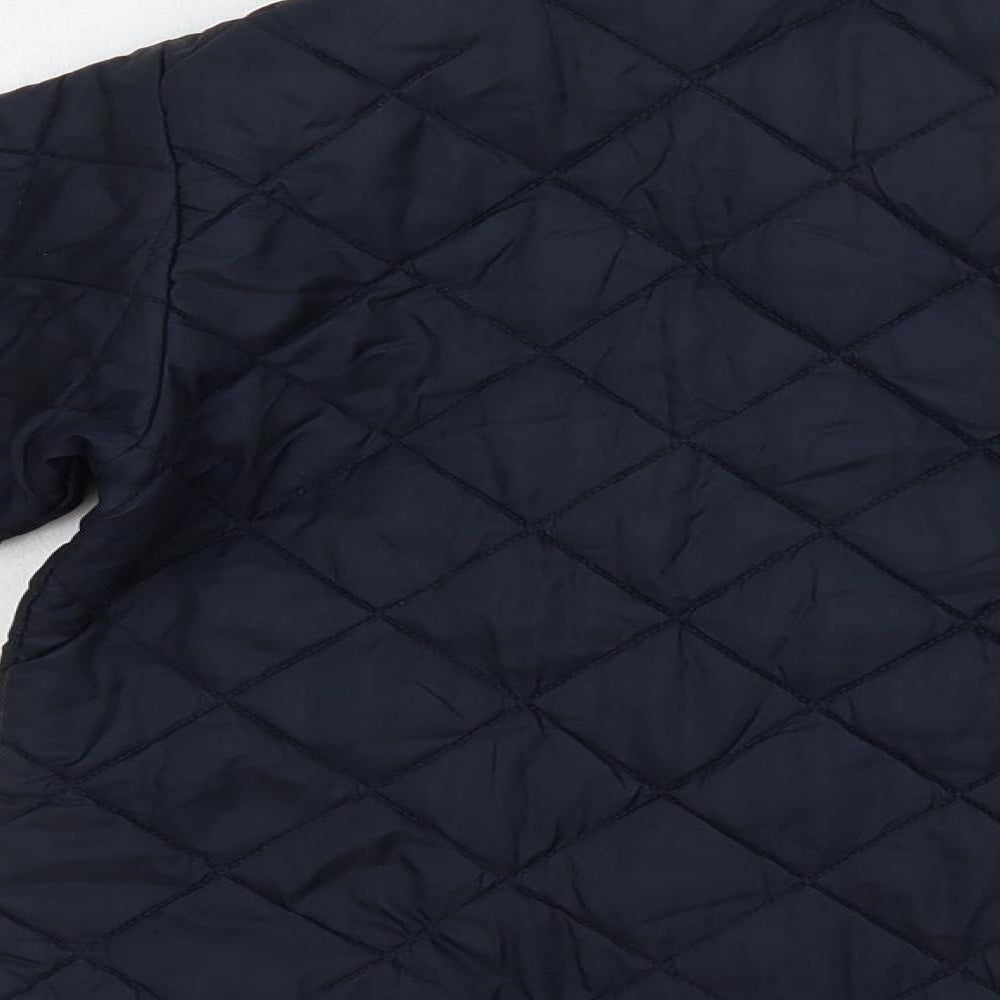 Brand and care label for United Colors of Benetton boys’ blue quilted jacket, size 4, years snap