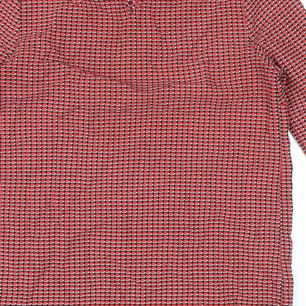 Brand and care label for Dunnes women’s red geometric polyester basic blouse, size XS, round neck