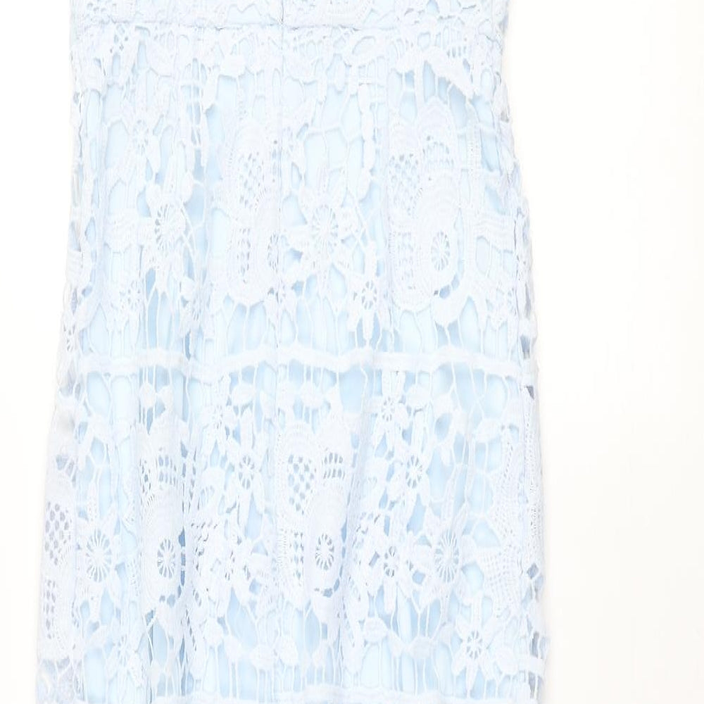 Brand and care label for Missguided women’s blue polyester mermaid, size UK 8, round neck zip