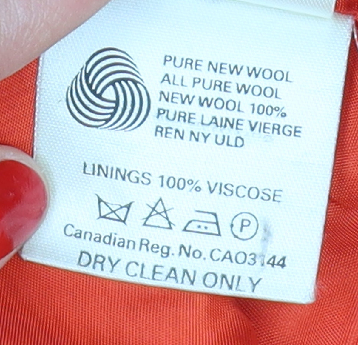 Brand and care label for Kenzo Women's Red jumper, size L