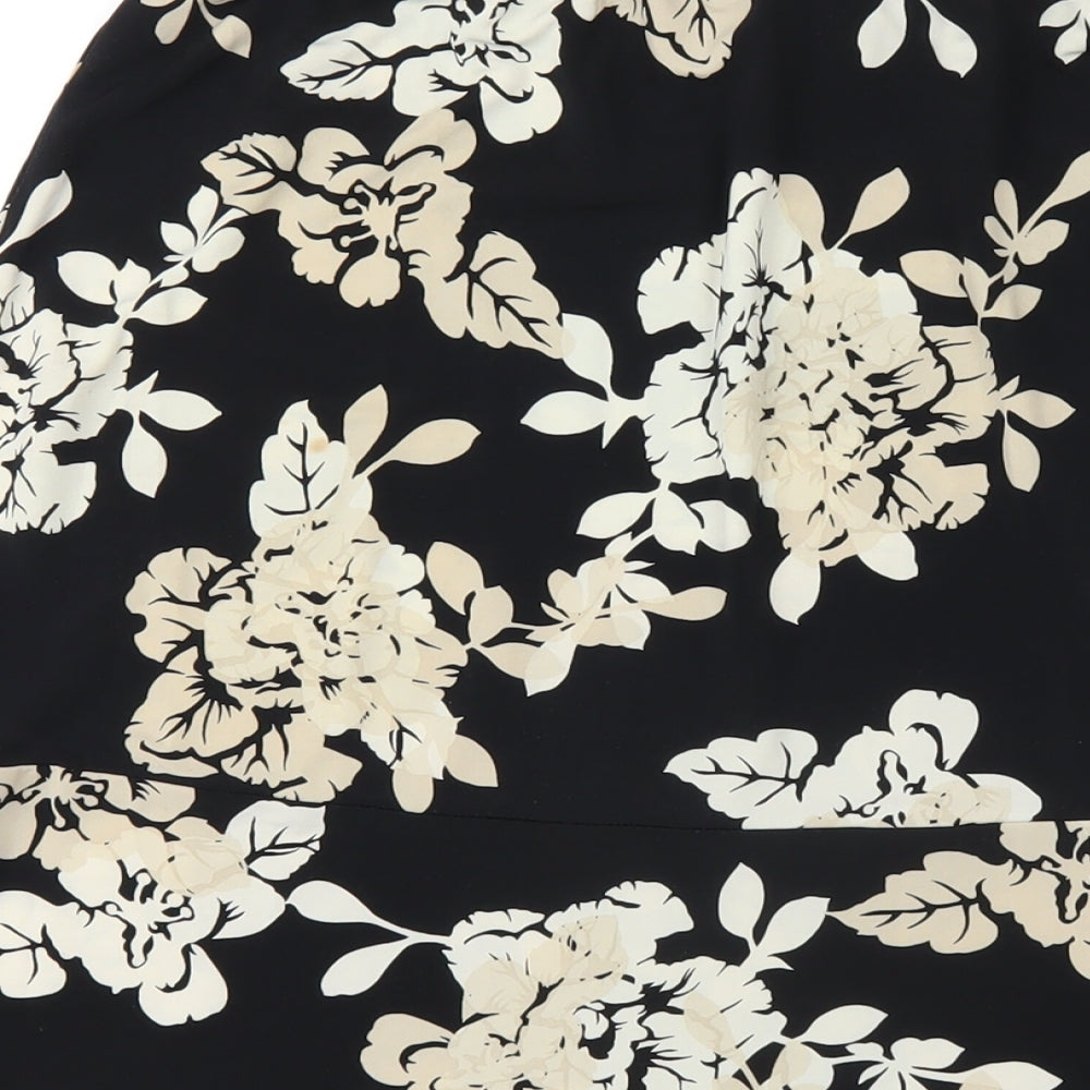 Brand and care label for BCBGMAXAZRIA women’s black floral polyester a-line skirt, size L