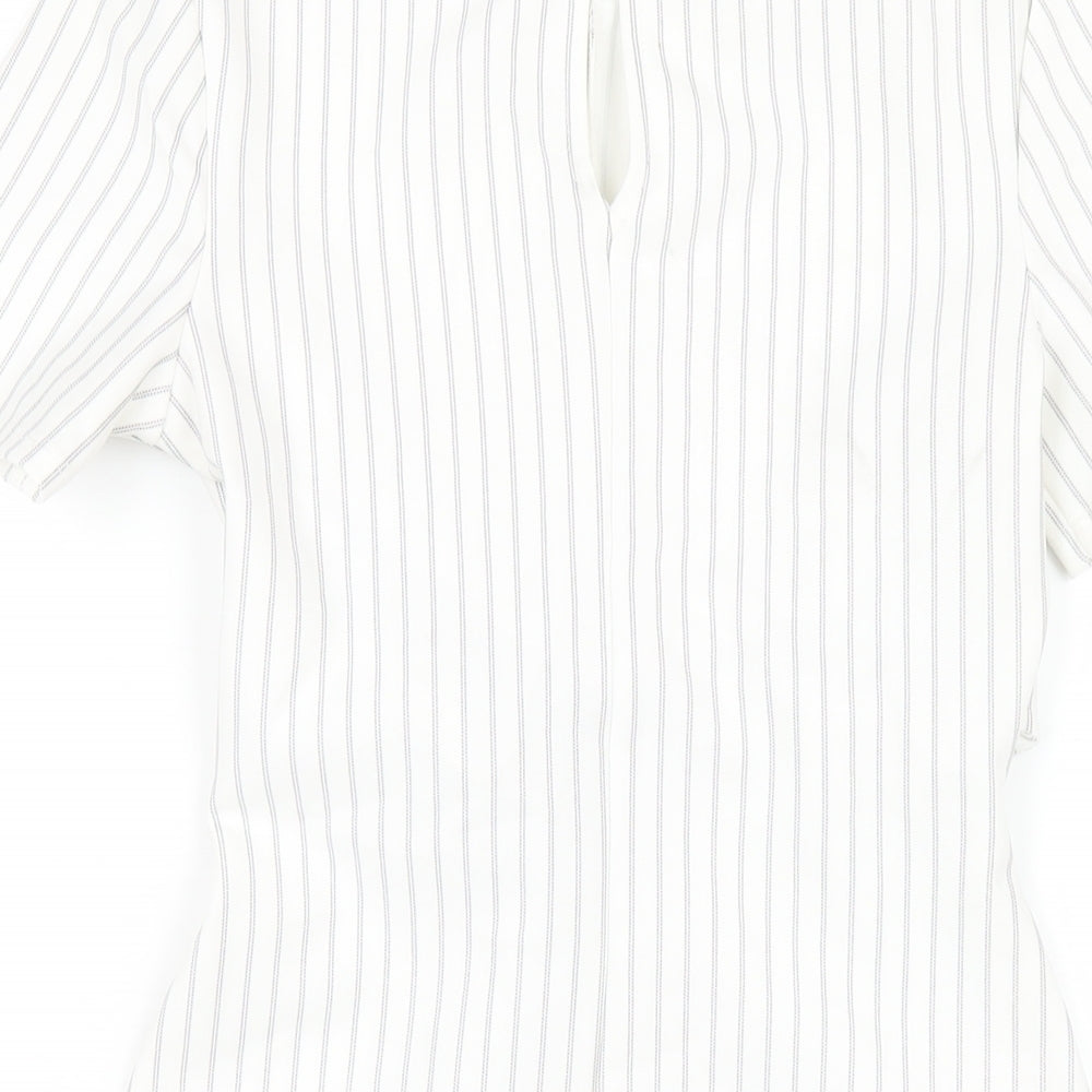Brand and care label for Miss Selfridge women’s white striped polyester bodycon, size UK 6, round neck button