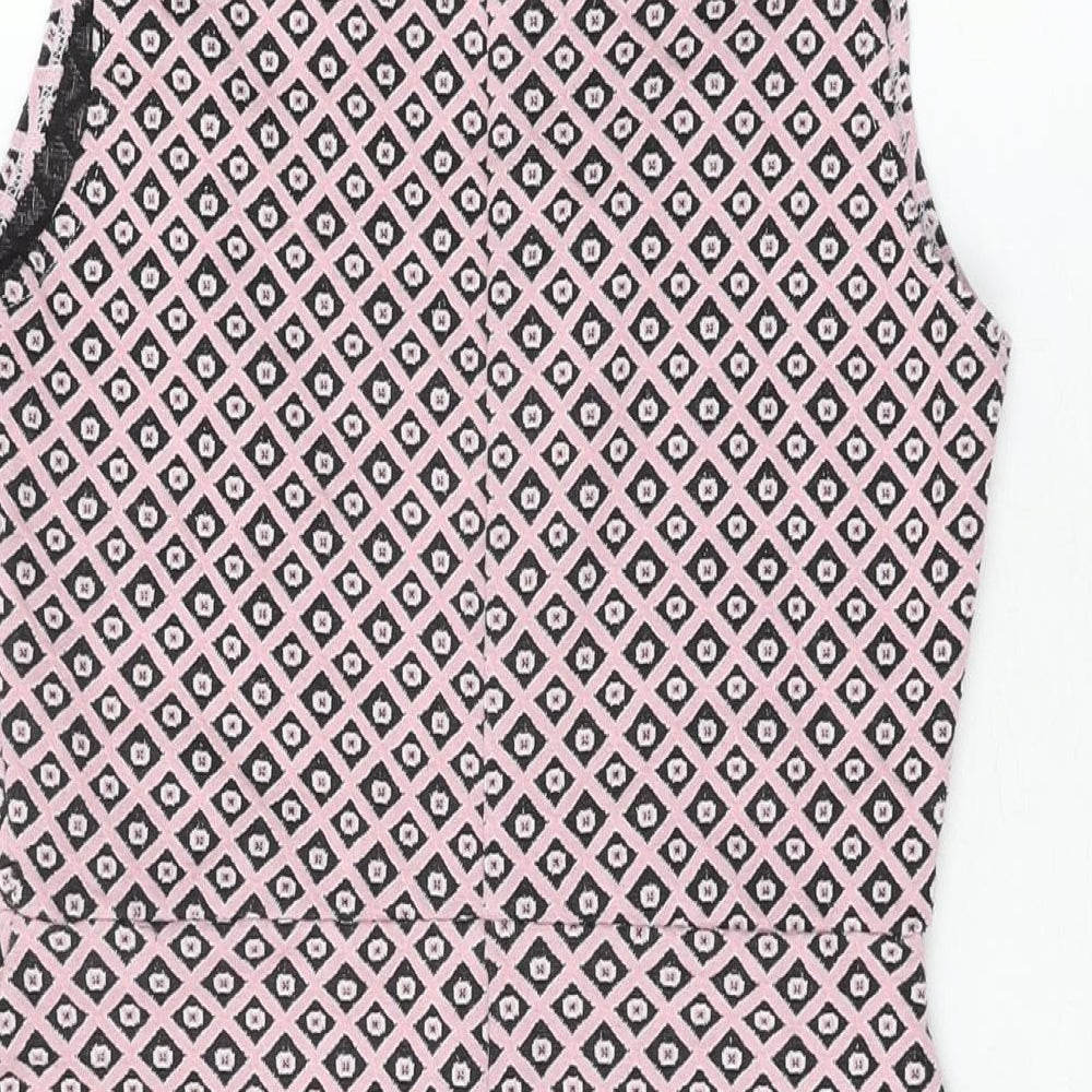 Brand and care label for Miss Selfridge women’s pink geometric polyester shift, size UK 12, v-neck pullover