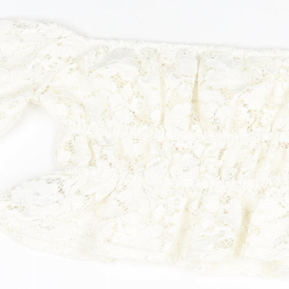 Brand and care label for H&M girls’ white floral cotton basic t-shirt, size 10-11, years off the shoulder pullover