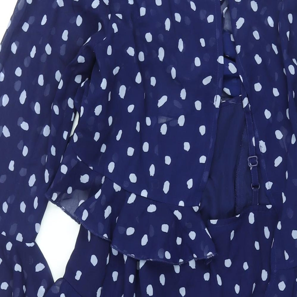 Brand and care label for ASOS women’s blue polka dot polyester shift, size UK 10, round neck zip - layered frill